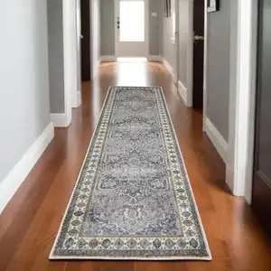 Photo of 8' Brown And Blue Medallion Runner Rug