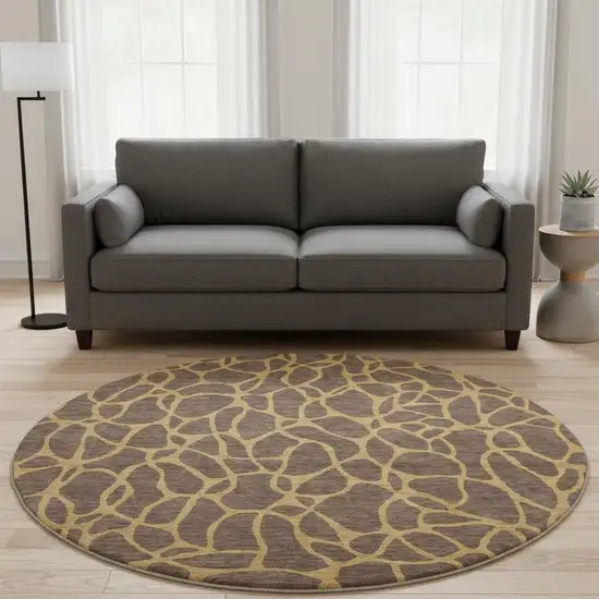 8' Brown And Gold Geometric Washable Round Rug With UV Protection Photo 2