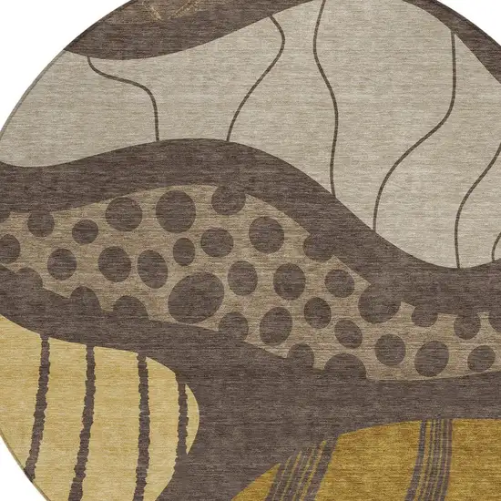 8' Brown And Gold Round Abstract Washable Indoor Outdoor Area Rug Photo 4