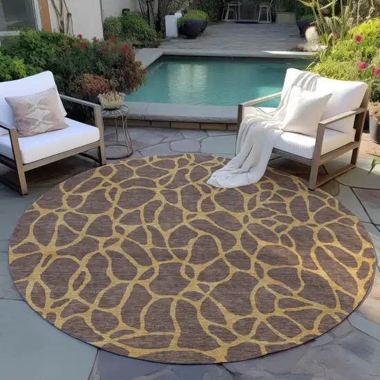 8' Brown And Gold Round Geometric Washable Indoor Outdoor Area Rug Photo 6