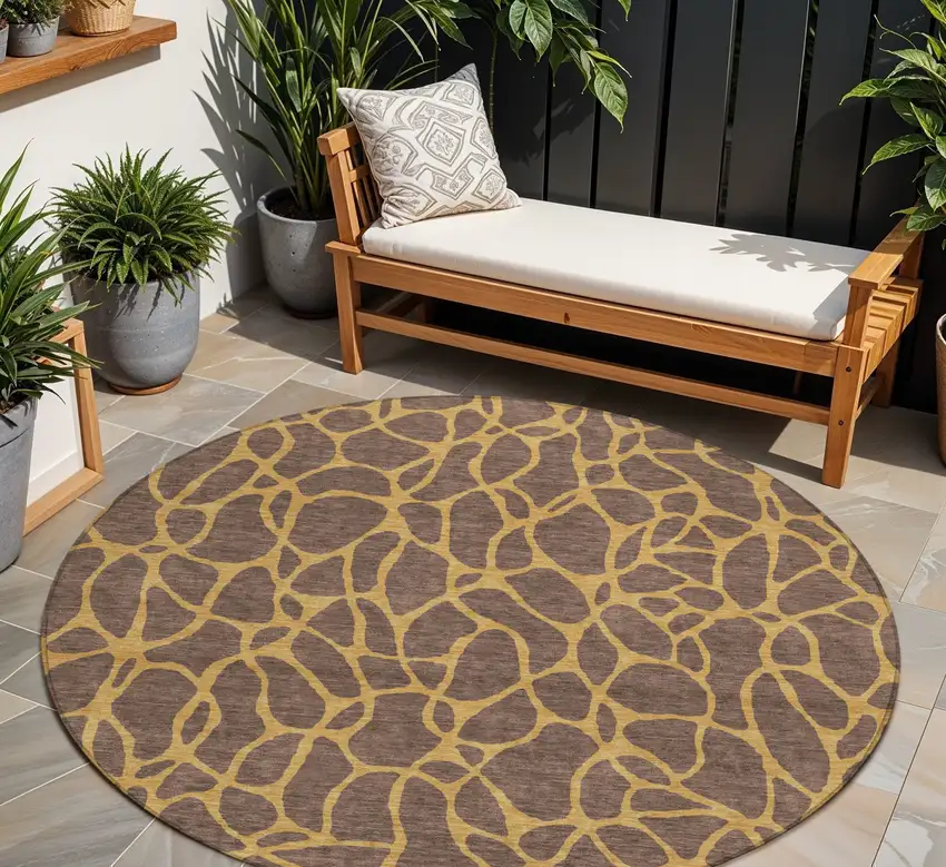 8' Brown And Gold Round Geometric Washable Indoor Outdoor Area Rug Photo 1