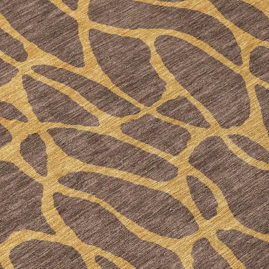 8' Brown And Gold Round Geometric Washable Indoor Outdoor Area Rug Photo 8