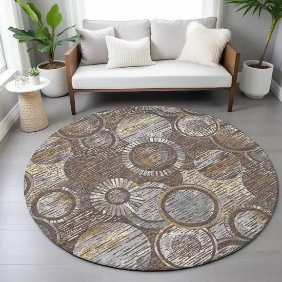 8' Brown And Gold Round Geometric Washable Indoor Outdoor Area Rug Photo 8