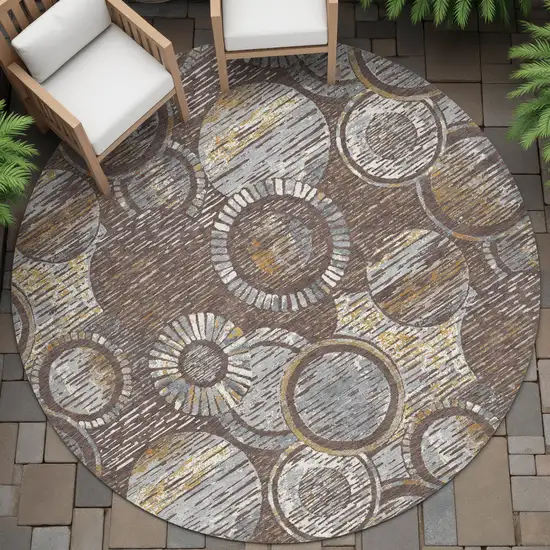 8' Brown And Gold Round Geometric Washable Indoor Outdoor Area Rug Photo 7
