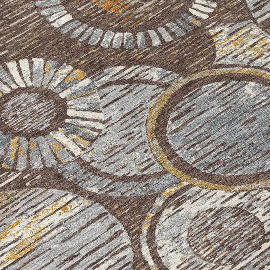 8' Brown And Gold Round Geometric Washable Indoor Outdoor Area Rug Photo 6