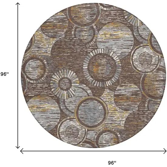 8' Brown And Gold Round Geometric Washable Indoor Outdoor Area Rug Photo 9