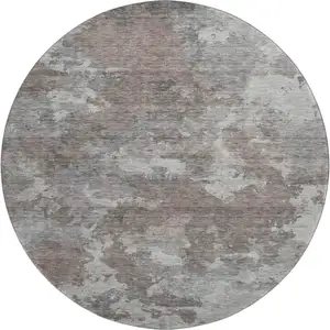 Photo of 8' Brown And Gray Abstract Washable Round Rug With UV Protection