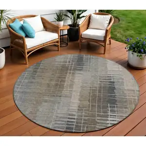Photo of 8' Brown And Gray Round Striped Washable Indoor Outdoor Area Rug