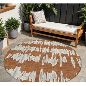 Photo of 8' Brown And Gray Round Striped Washable Indoor Outdoor Area Rug