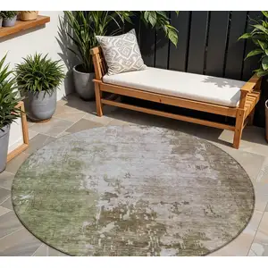Photo of 8' Brown And Green Round Abstract Washable Indoor Outdoor Area Rug