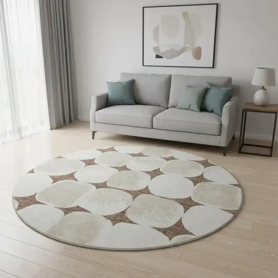 8' Brown And Ivory Abstract Geometric Washable Round Rug With UV Protection Photo 2