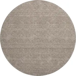 Photo of 8' Brown And Ivory Abstract Geometric Washable Round Rug With UV Protection