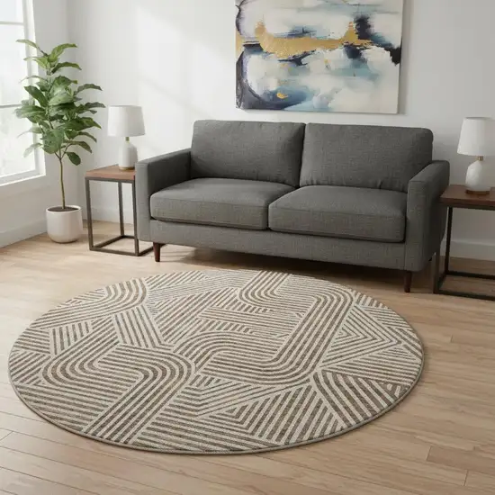 8' Brown And Ivory Abstract Geometric Washable Round Rug With UV Protection Photo 2