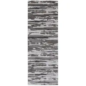 Photo of 8' Brown And Ivory Abstract Power Loom Distressed Stain Resistant Runner Rug