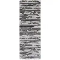 Photo of 8' Brown And Ivory Abstract Power Loom Distressed Stain Resistant Runner Rug