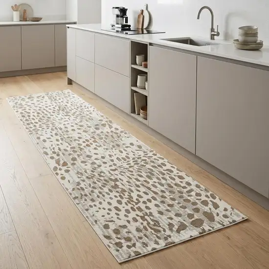 8' Brown And Ivory Abstract Stain Resistant Runner Rug Photo 1