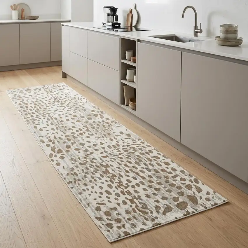 8' Brown And Ivory Abstract Stain Resistant Runner Rug Photo 1