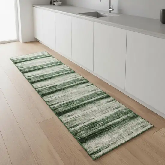 8' Green And Ivory Abstract Washable Runner Rug Photo 1