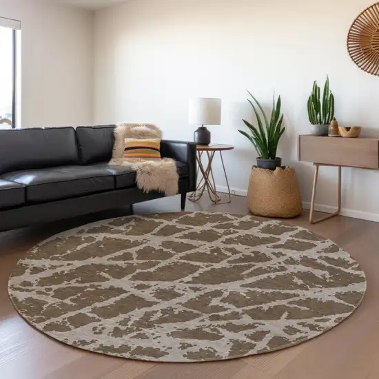 8' Brown And Ivory Abstract Washable Round Rug With UV Protection Photo 5