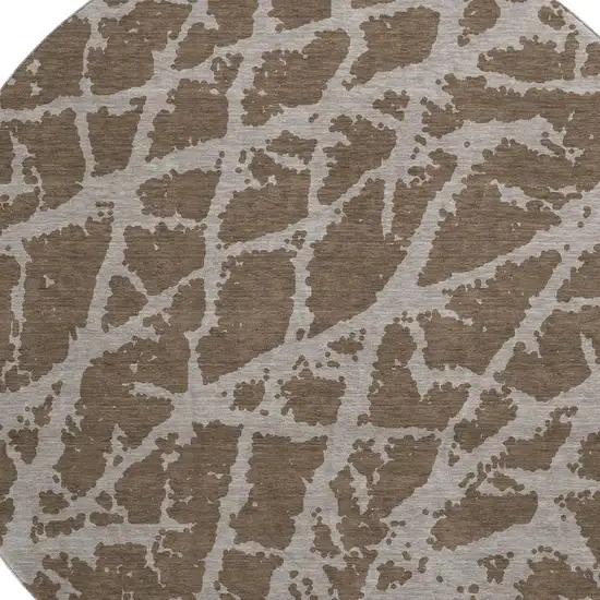 8' Brown And Ivory Abstract Washable Round Rug With UV Protection Photo 3