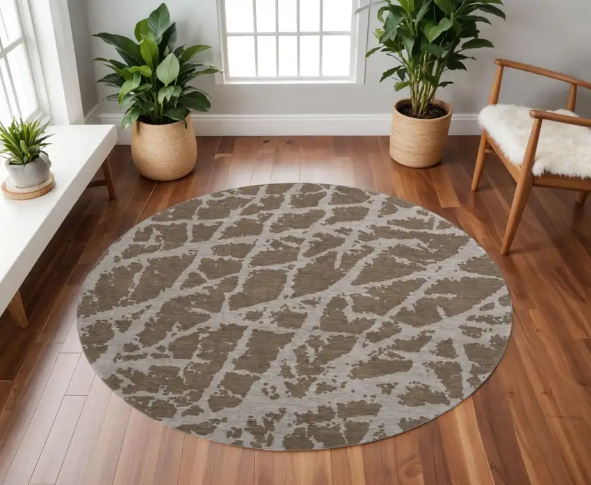 8' Brown And Ivory Abstract Washable Round Rug With UV Protection Photo 2
