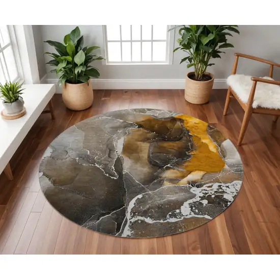 8' Brown And Ivory Abstract Washable Round Rug With UV Protection Photo 2