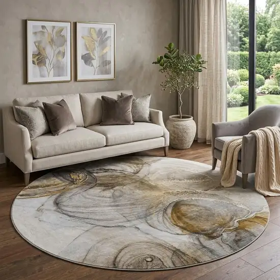 8' Brown And Ivory Abstract Washable Round Rug With UV Protection Photo 1