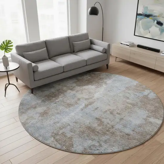 8' Brown And Ivory Abstract Washable Round Rug With UV Protection Photo 2