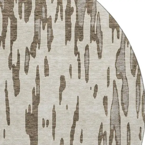 8' Brown And Ivory Abstract Washable Round Rug With UV Protection Photo 3