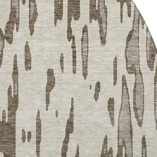 8' Brown And Ivory Abstract Washable Round Rug With UV Protection Photo 2