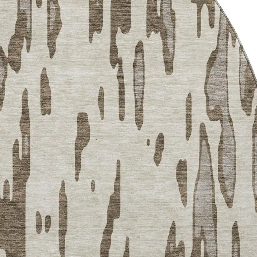 8' Brown And Ivory Abstract Washable Round Rug With UV Protection Photo 2