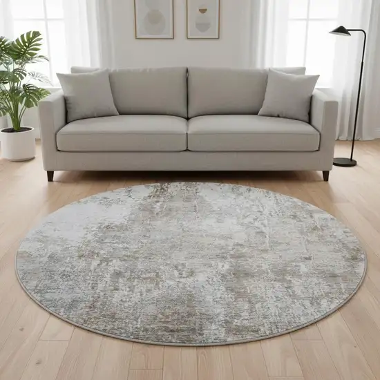 8' Brown And Ivory Abstract Washable Round Rug With UV Protection Photo 2