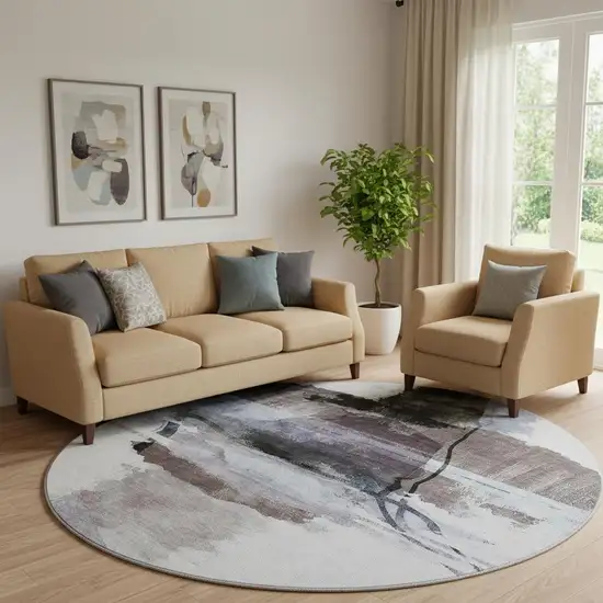 8' Brown And Ivory Abstract Washable Round Rug With UV Protection Photo 2