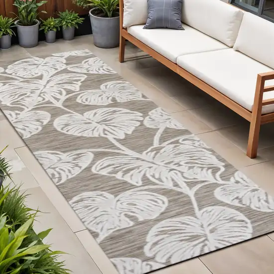 8' Brown And Ivory Floral Indoor Outdoor Runner Rug Photo 1