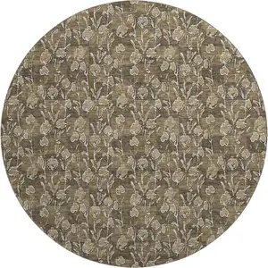 Photo of 8' Brown And Ivory Floral Washable Round Rug With UV Protection