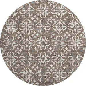 Photo of 8' Brown And Ivory Floral Washable Round Rug With UV Protection