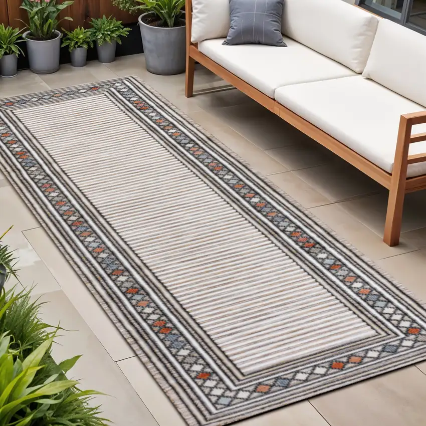 8' Brown And Ivory Geometric Indoor Outdoor Runner Rug Photo 1