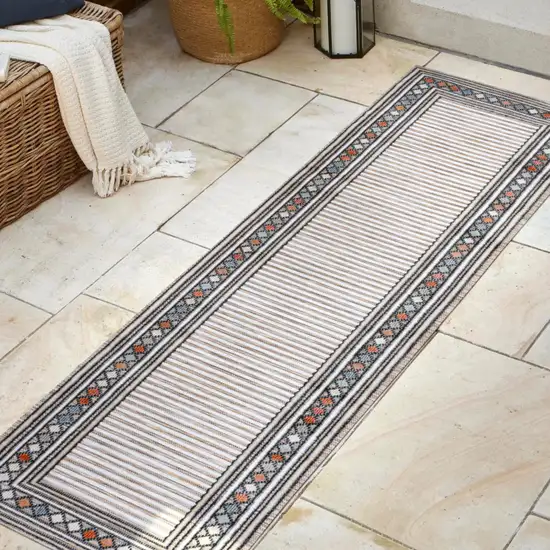 8' Brown And Ivory Geometric Indoor Outdoor Runner Rug Photo 5