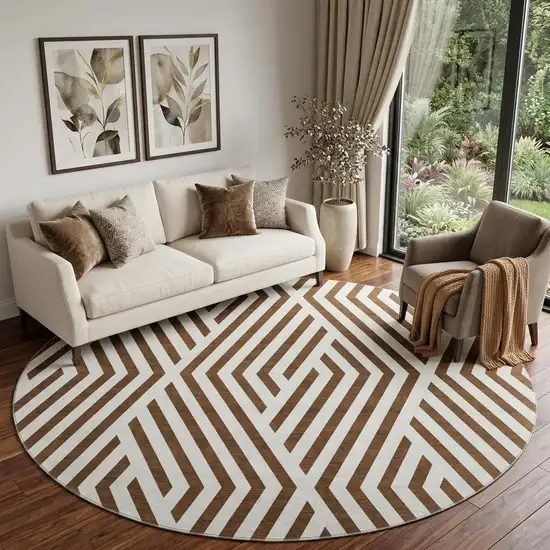 8' Brown And Ivory Geometric Washable Round Rug With UV Protection Photo 1