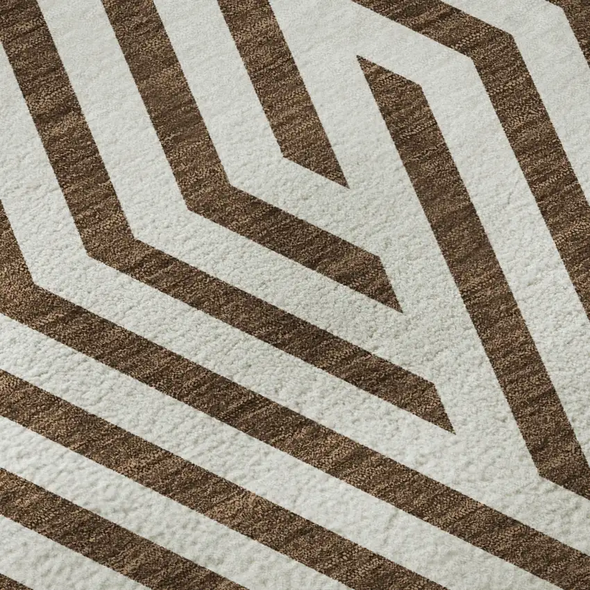 8' Brown And Ivory Geometric Washable Round Rug With UV Protection Photo 9