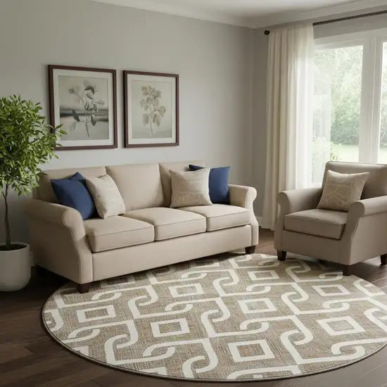 8' Brown And Ivory Geometric Washable Round Rug With UV Protection Photo 1