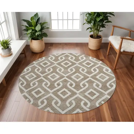 8' Brown And Ivory Geometric Washable Round Rug With UV Protection Photo 3
