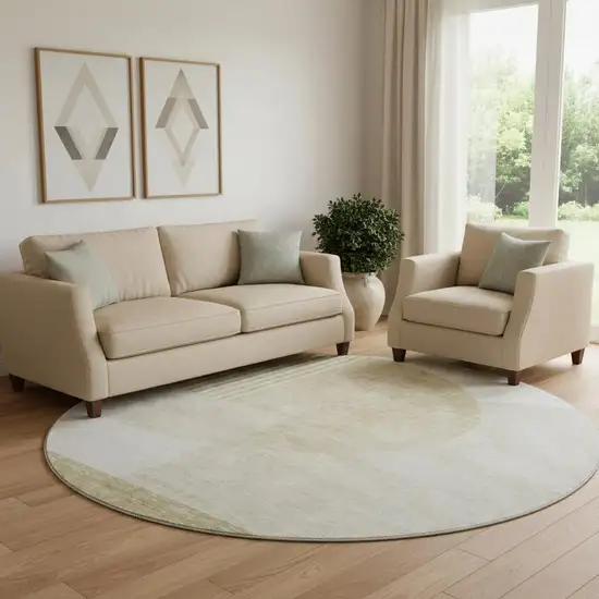 8' Brown And Ivory Geometric Washable Round Rug With UV Protection Photo 1