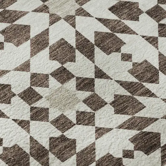 8' Brown And Ivory Geometric Washable Round Rug With UV Protection Photo 9