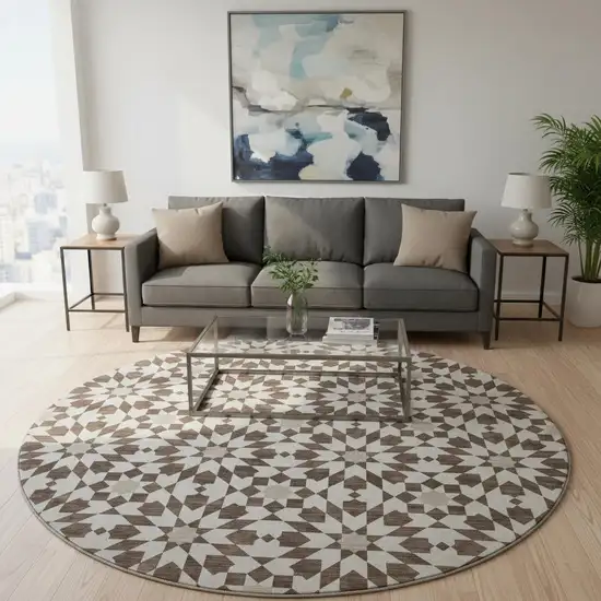 8' Brown And Ivory Geometric Washable Round Rug With UV Protection Photo 2