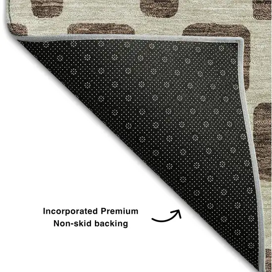 8' Brown And Ivory Geometric Washable Round Rug With UV Protection Photo 6