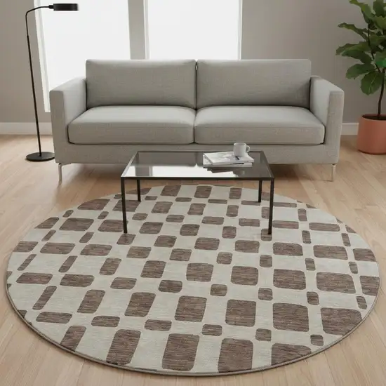 8' Brown And Ivory Geometric Washable Round Rug With UV Protection Photo 2