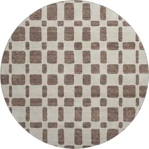 Photo of 8' Brown And Ivory Geometric Washable Round Rug With UV Protection
