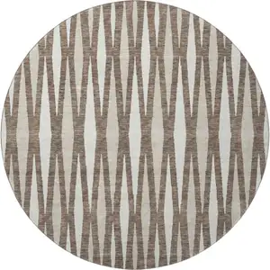 Photo of 8' Brown And Ivory Geometric Washable Round Rug With UV Protection