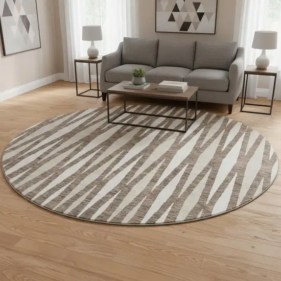 8' Brown And Ivory Geometric Washable Round Rug With UV Protection Photo 2